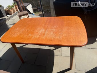 Teak extendable dining table with 6 chairs