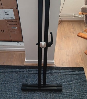 Keyboard Stand and 5 learning music books.