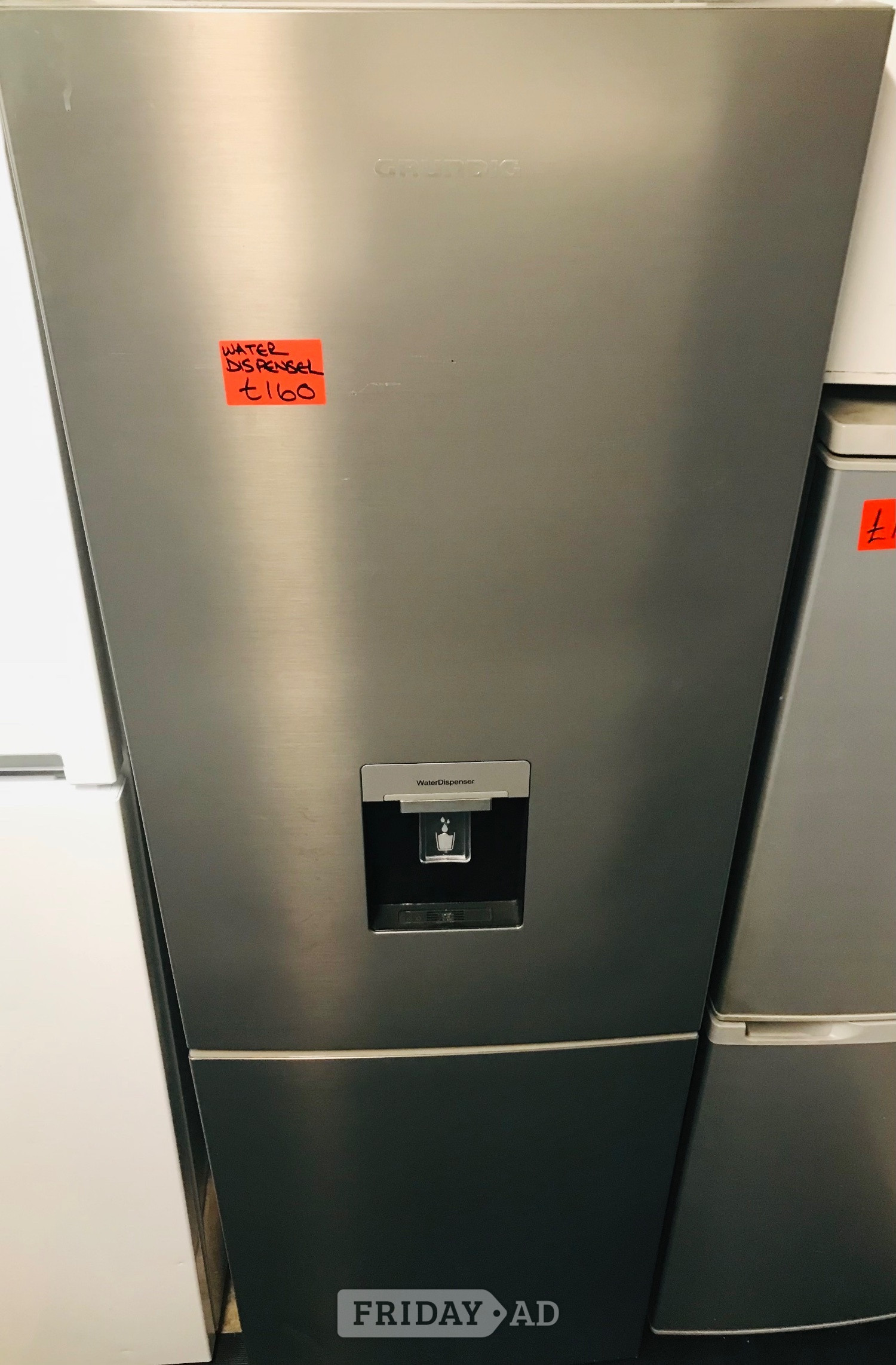 Grundig Silver colour fridge freezer with water dispenser  in Northampton