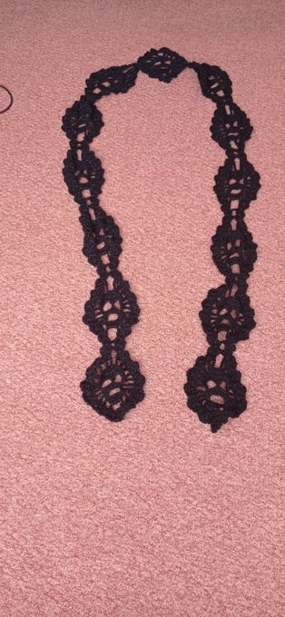black sparkly skull scarf approx 10 ft long  hand crocheted
