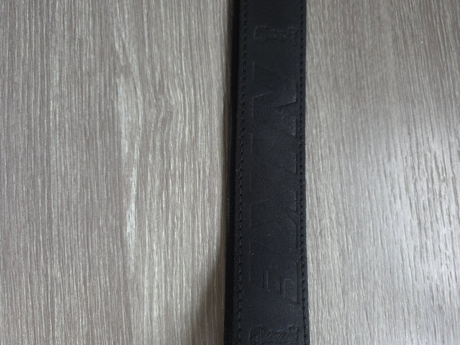 Vintage black Nike leather belt featuring an embossed Nike spello in Westcliff-On-Sea