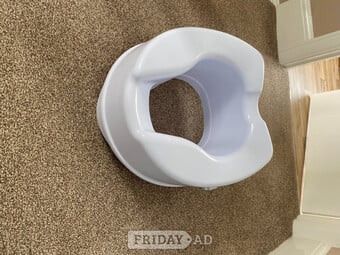 Raised toilet seat 4" no lid