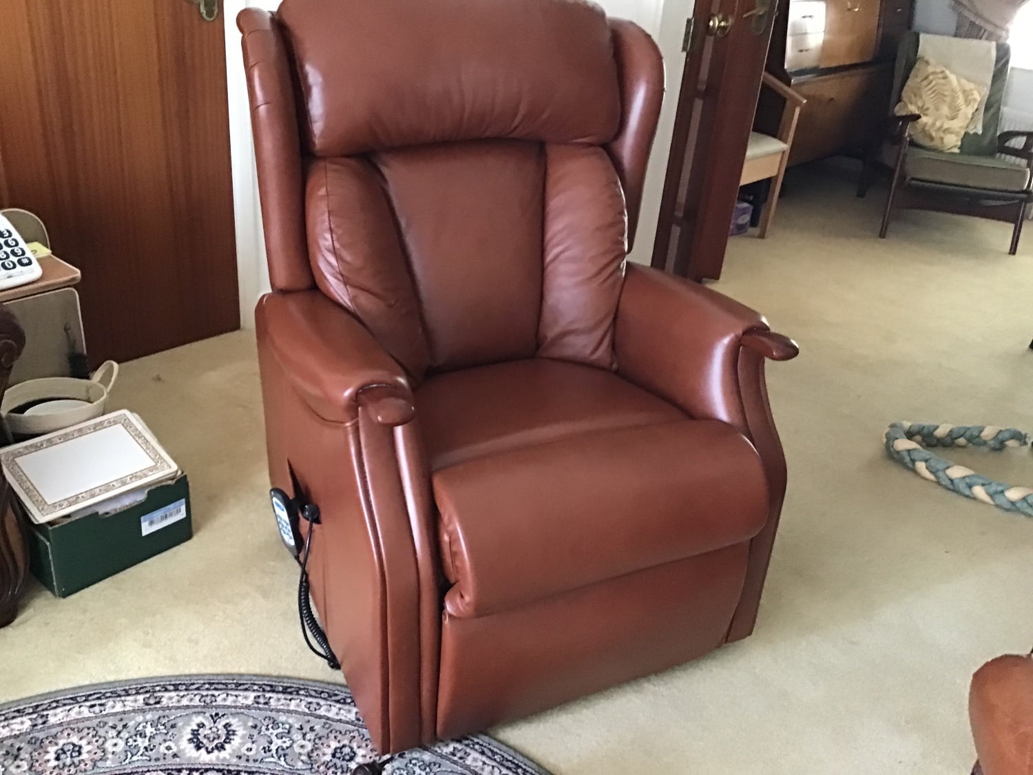 As new leather Celebrity Grande riser/recliner chair - Furniture