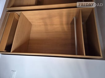 Ikea wardrobes with hanging rails draw spce and a glass top 
