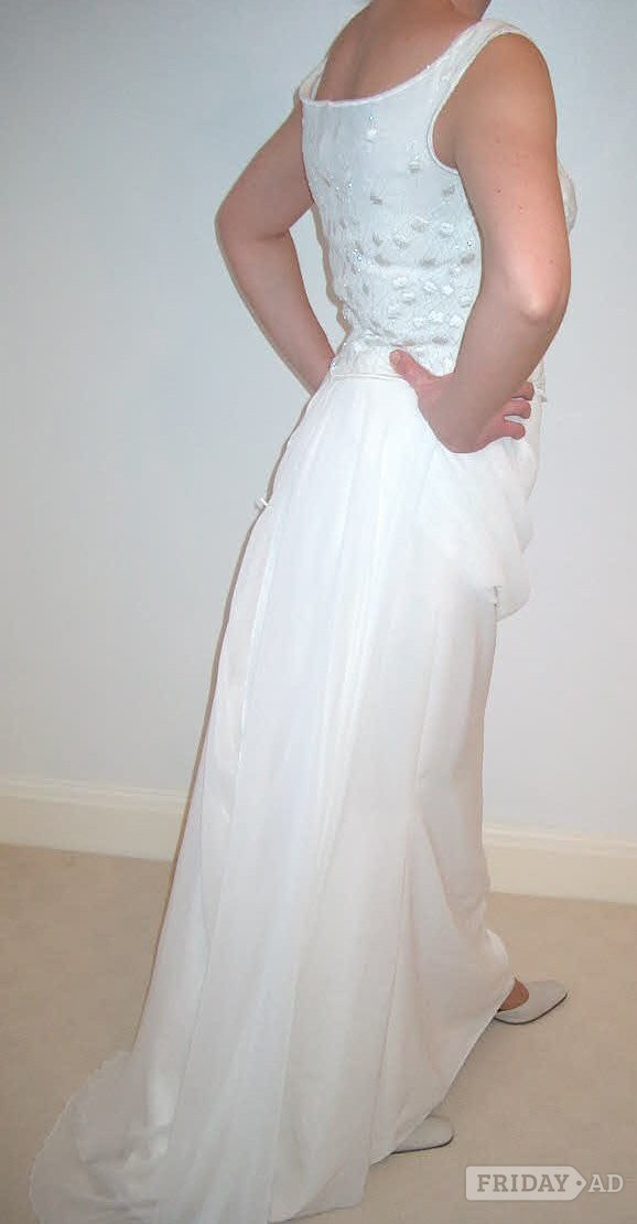 WEDDING DRESS by the world renowned brand & specialist wedding dress makers “Pronovias Collection”. 