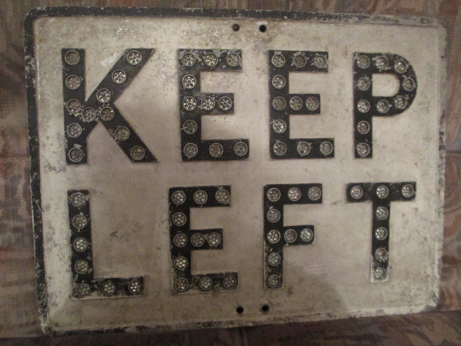 A VINTAGE BRITISH ROAD SIGN WITH REFLECTORS in Hastings