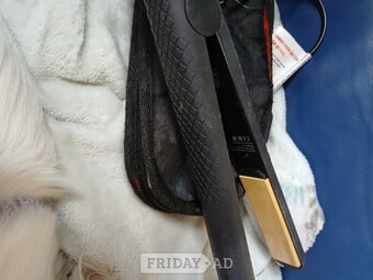 Hair straighteners with case