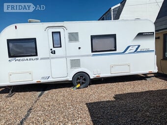 pegasus verona gt70  2018 model touring caravan 4 berth in immediate condition comes with  awning roof solar panel fixed double bed and pull out beds full cooker gas grill oven and hob hardly used full fridge and freezer bathroom sink toilet and shower spear set of sofa covers for winter ect water containers wardrobe loads of cupboard space pull out room privacy screen curtains and fly screen with pull down blinds plug sockets gas bottles  tv and table pioneer wall surround sound system can send video of inside and outside  only selling because of change in circumstances  well looked after must be  seen