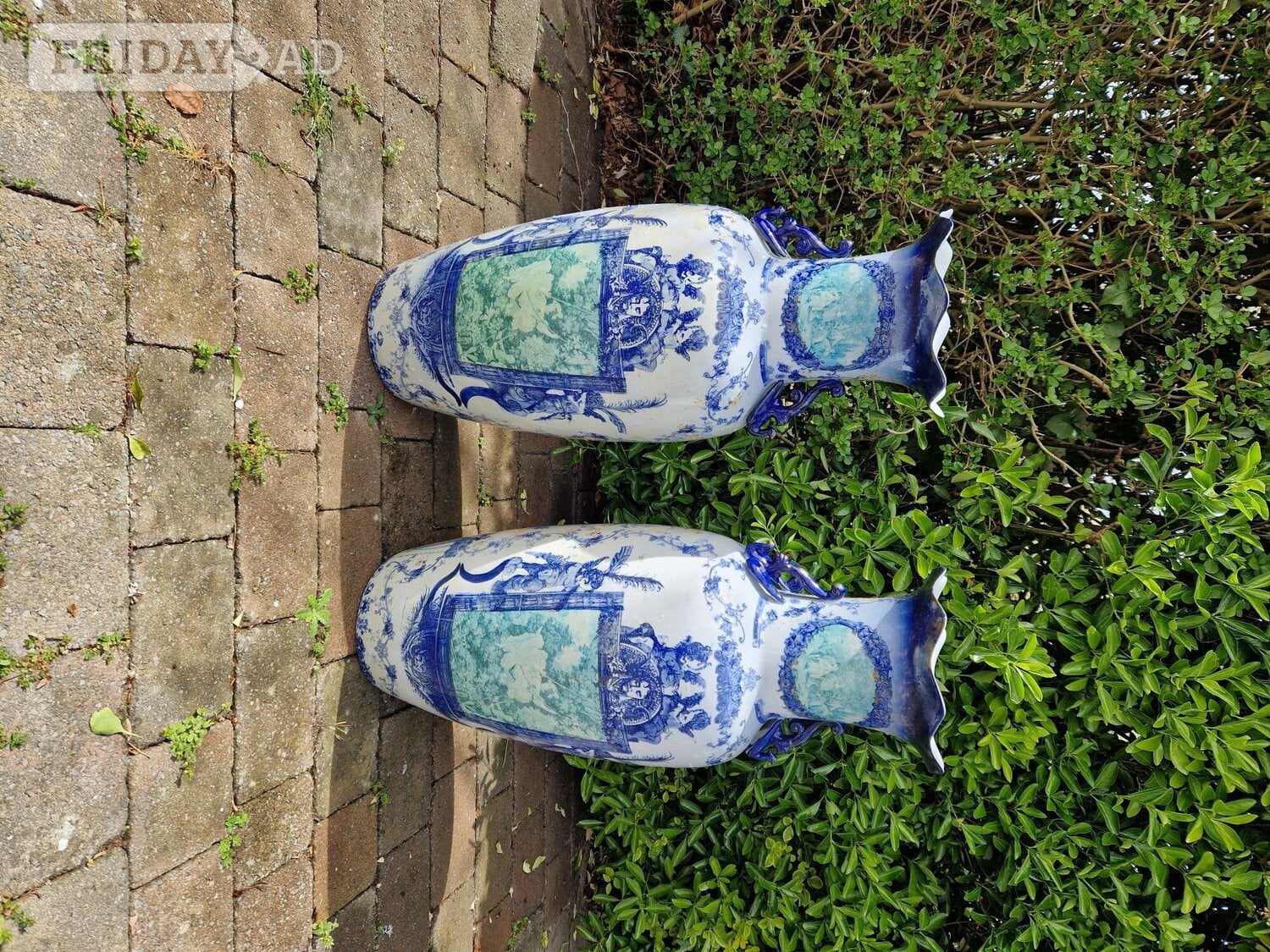 Worthing Patio Parasol. Chinese Vases