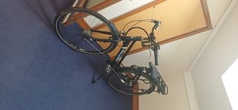 Rayleigh step through power assisted bike