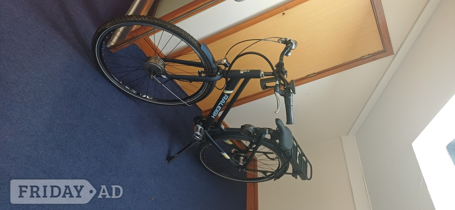 Rayleigh step through power assisted bike