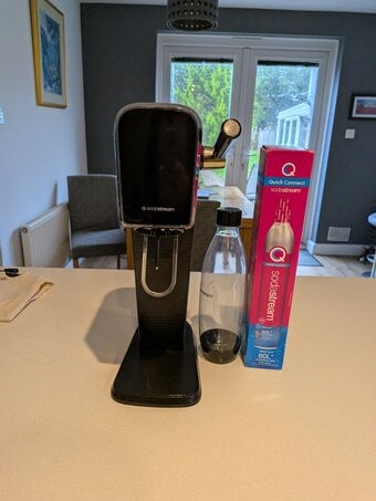 Soda stream appliance with extra gas cylinder and water bottle 