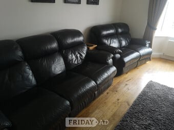 3 and 2 seater black leather sofas. Full electric recliners in full working order.