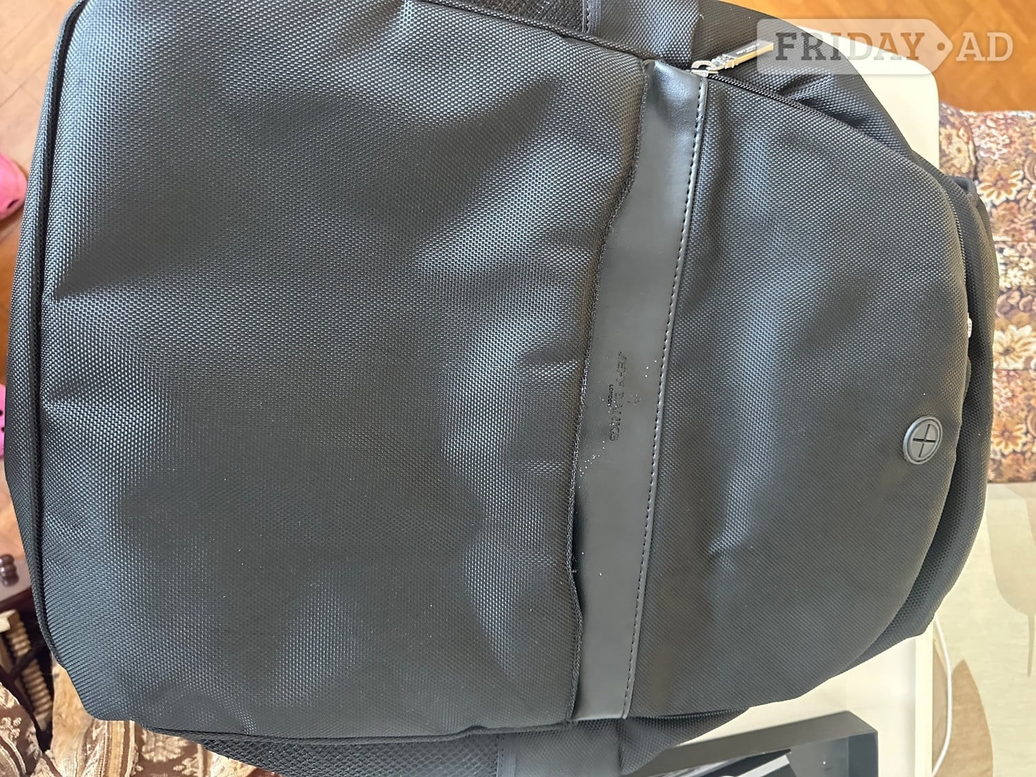 Black laptop bag with multiple zipped pockets