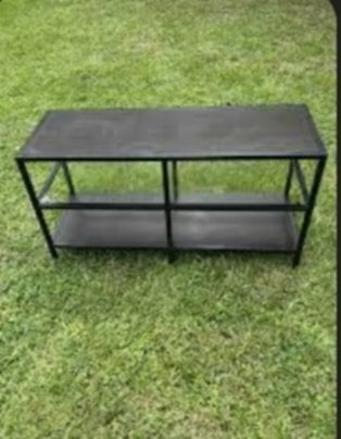 IKEA stand with a glass shelf