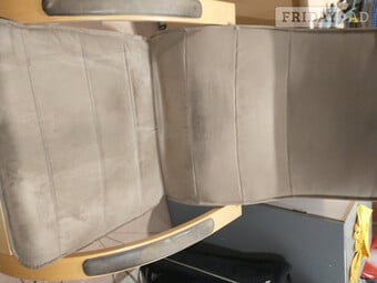 EComfortable chair. Wood surrounds.