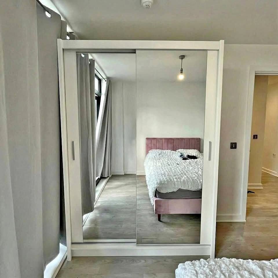 IKEA 150 cm Wardrobe with 2 sliding mirror doors for sale