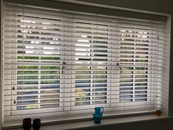 Wooden, white venetian blinds 