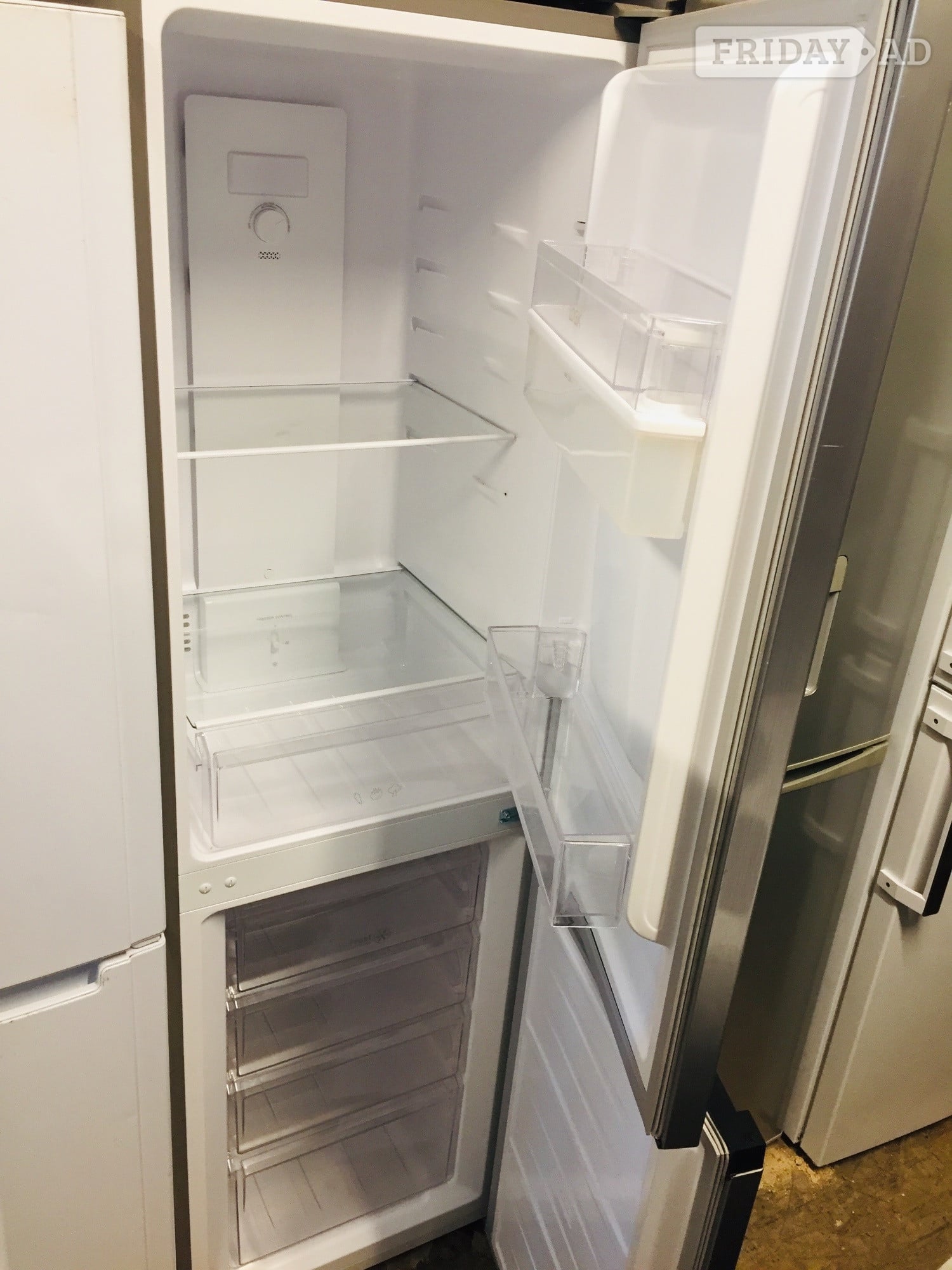 Logik fridge freezer with water dispenser in excellent condition.