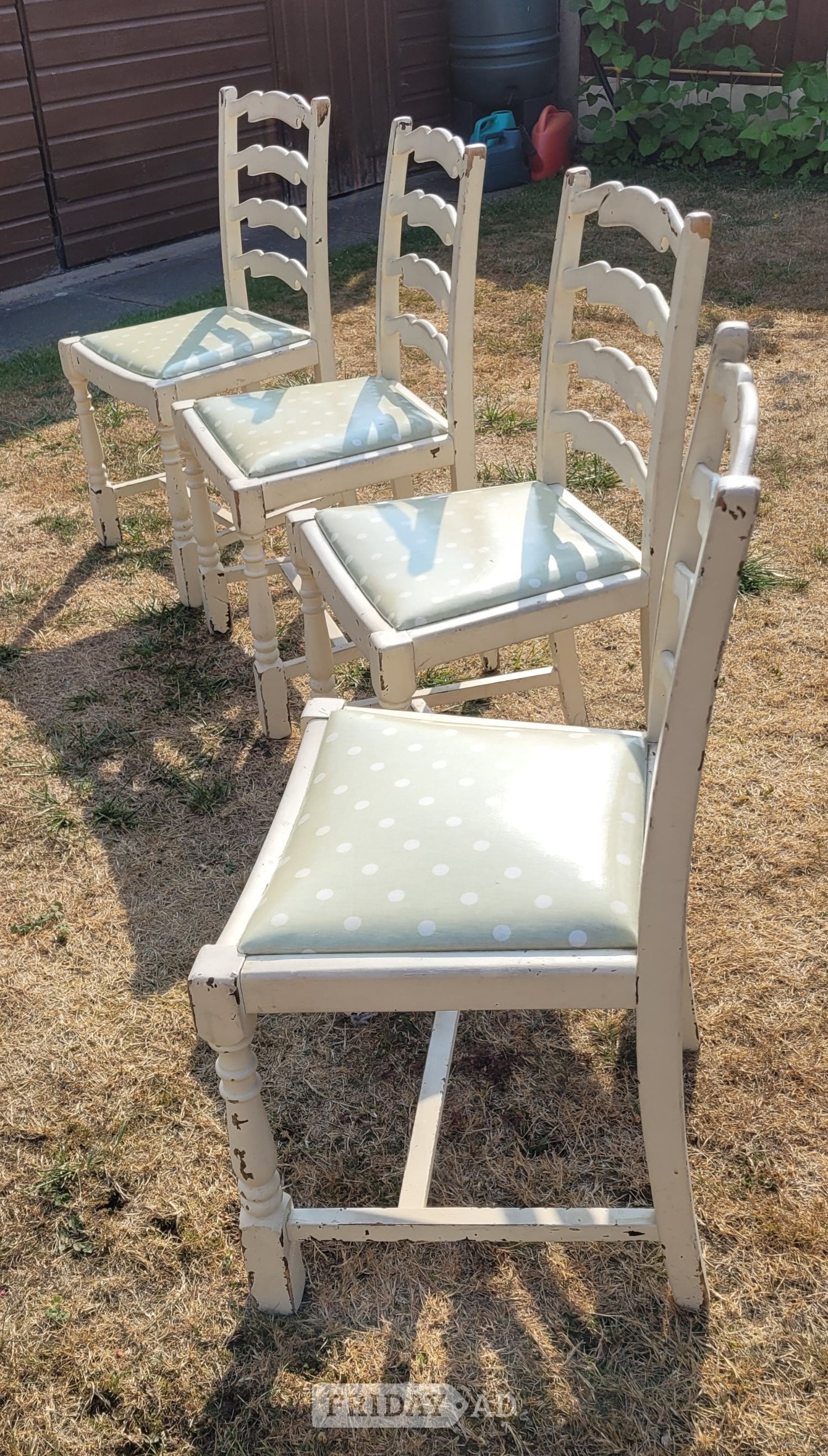 A set of four charming cream wooden dining chairs,  in Sittingbourne