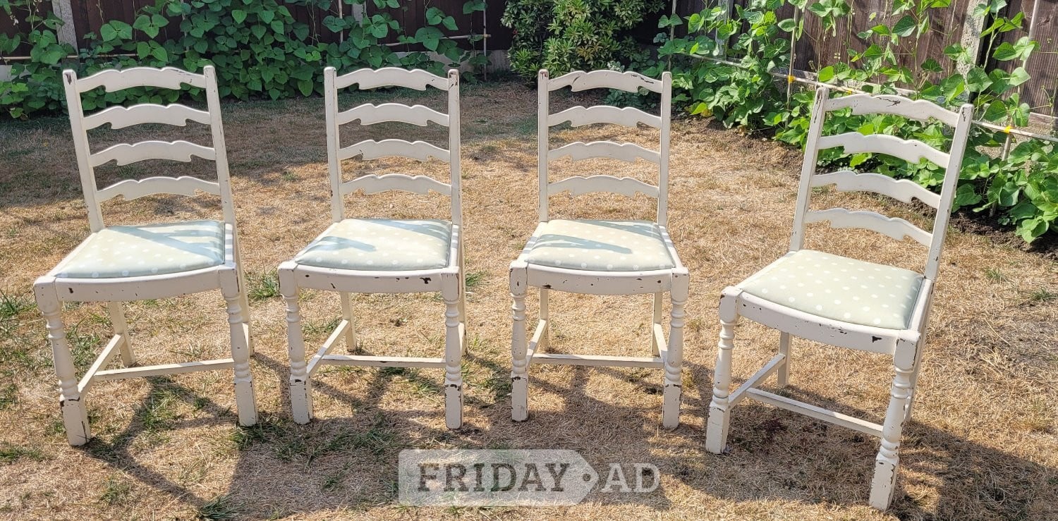 A set of four charming cream wooden dining chairs, 