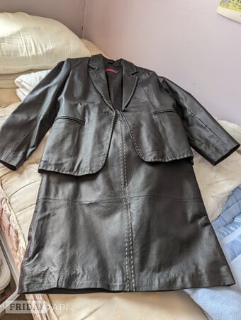 Black leather skirt and jacket suit 