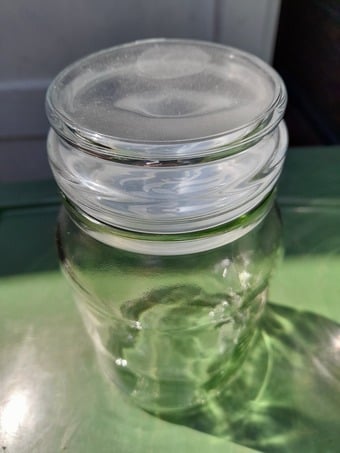 2 glass storage jars 