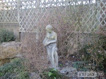 Three Stone Garden Statues