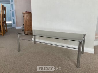 FREECoffee table. Smoked glass top, chrome frame. 43” x 20” x 15”