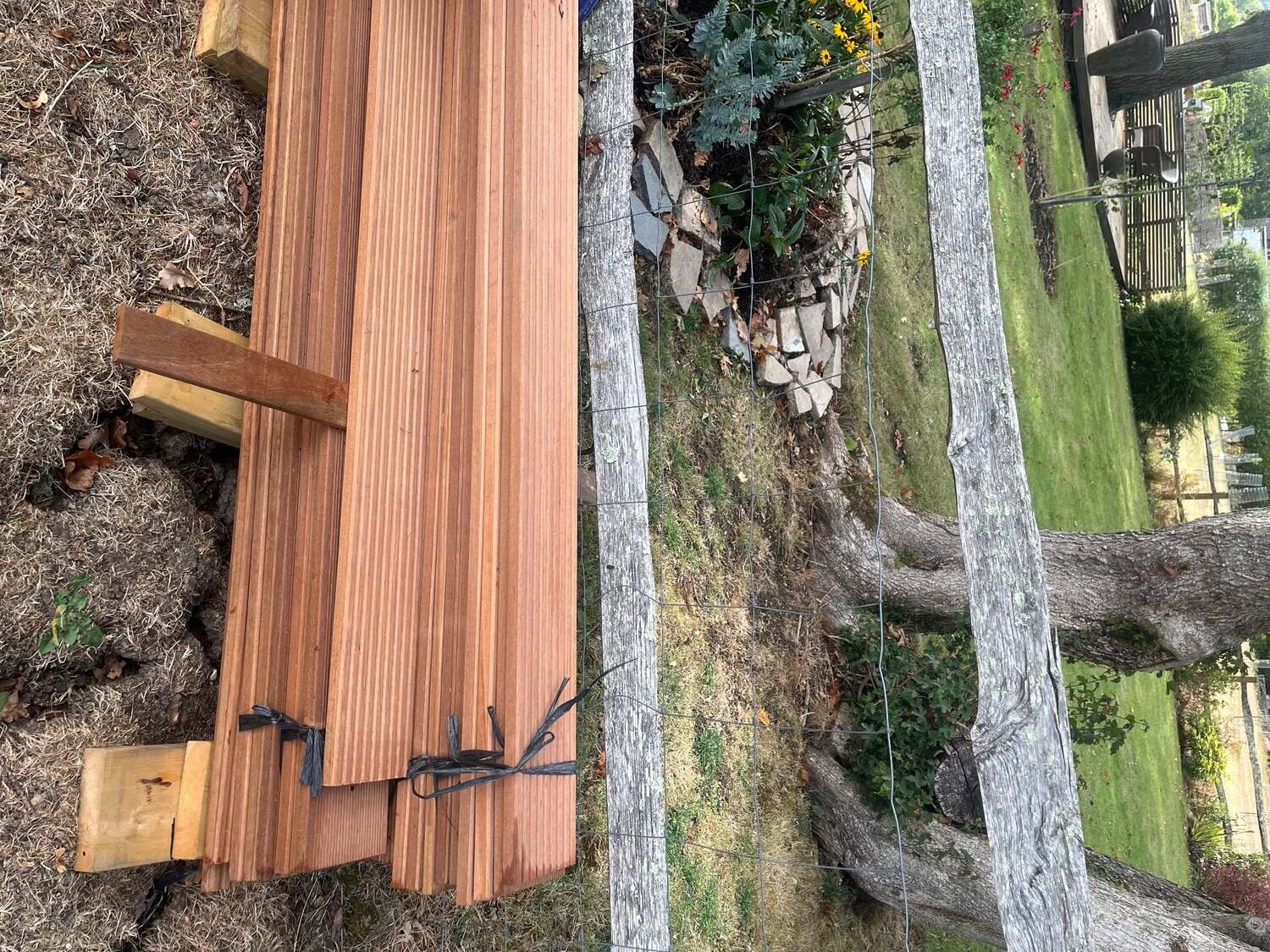 Haywards Heath 25 Brand New Iroko Hardwood decking boards each measuring 4m. 