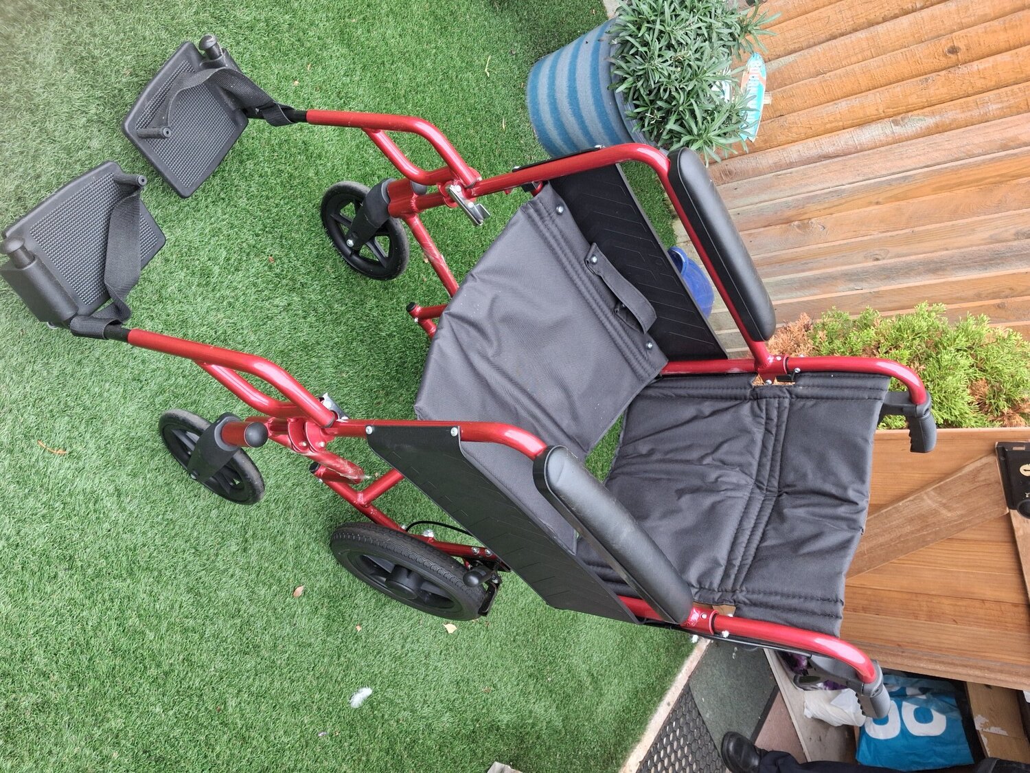 A lightweight wheel chair New used once instruction book