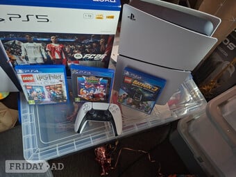 Practically new ps5 console colour white 1TB  and controllers  an