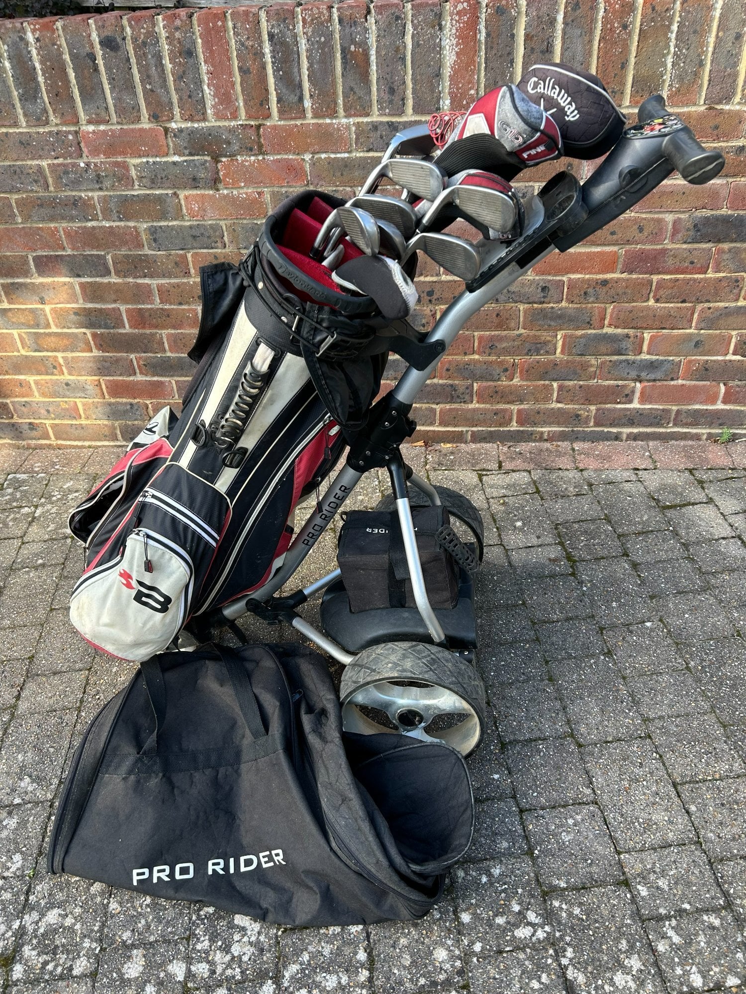 Golf Clubs and Electric Trolley. 