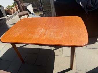 Teak extendable dining table with 6 chairs