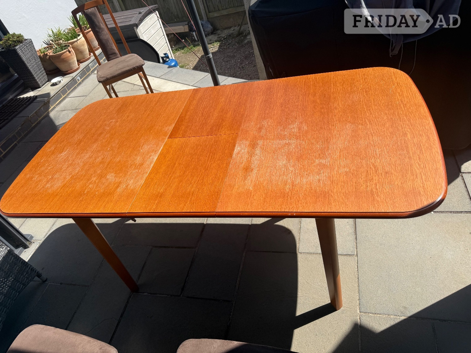 Teak extendable dining table with 6 chairs