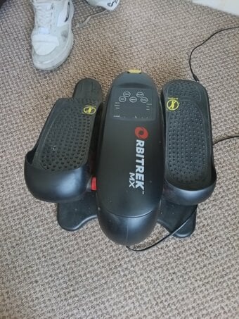 Rbitrek foot/leg exercise/blood flow.sit down