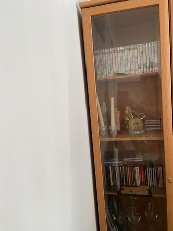 A fairy tall display cabinet brown