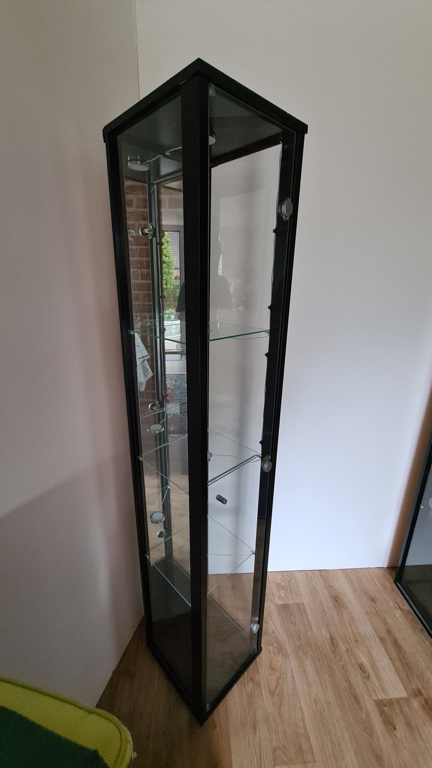 Glass display cabinet painted black 