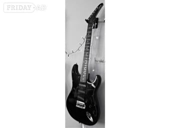 Stratocaster Guitar. EPIPHONE STRAT in BLACK.  Good working order and few are for sale