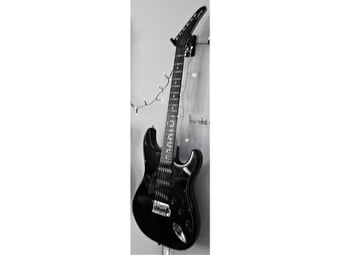 Stratocaster Guitar. EPIPHONE STRAT in BLACK.  Good working order and few are for sale