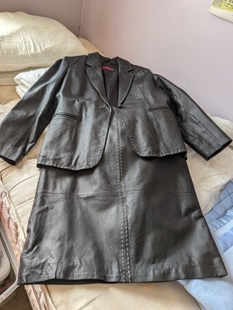 Black leather skirt and jacket suit 