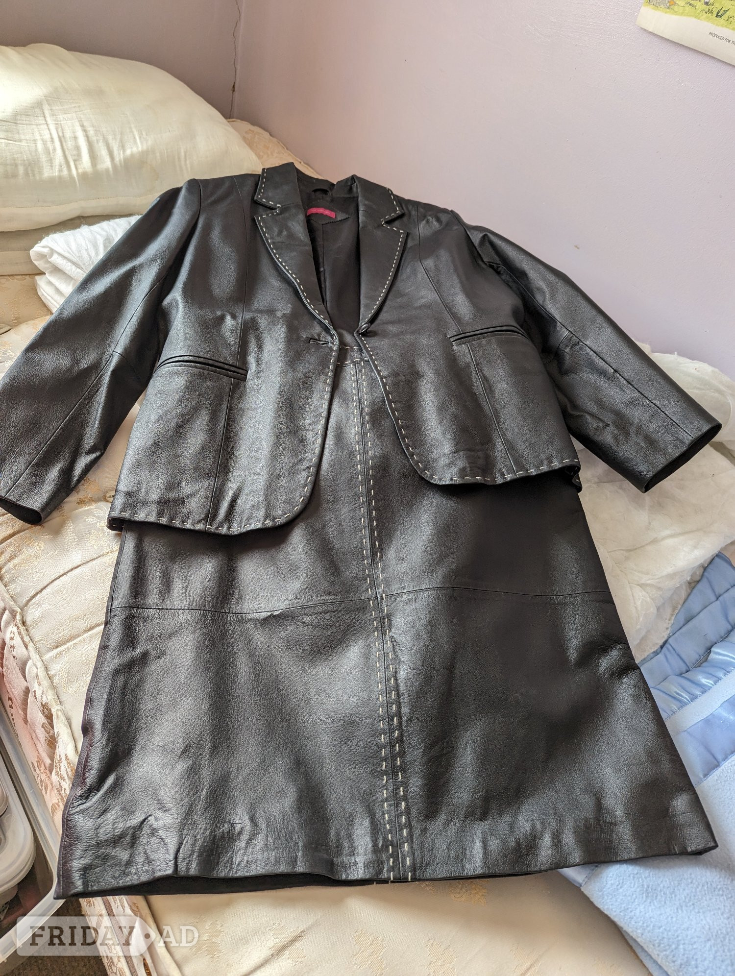 Black leather skirt and jacket suit 