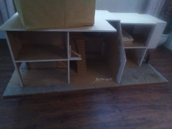 Free unfinished Emporium Dolls house