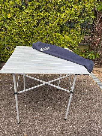 Square folding camping table.