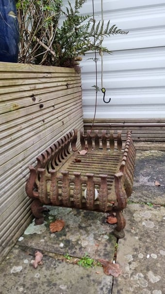 Caste iron grate