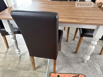 Table and 4 leather chairs