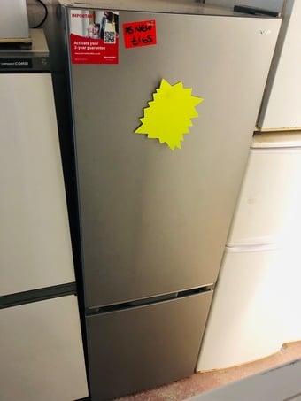 Sharp frost free silver fridge freezer as new .