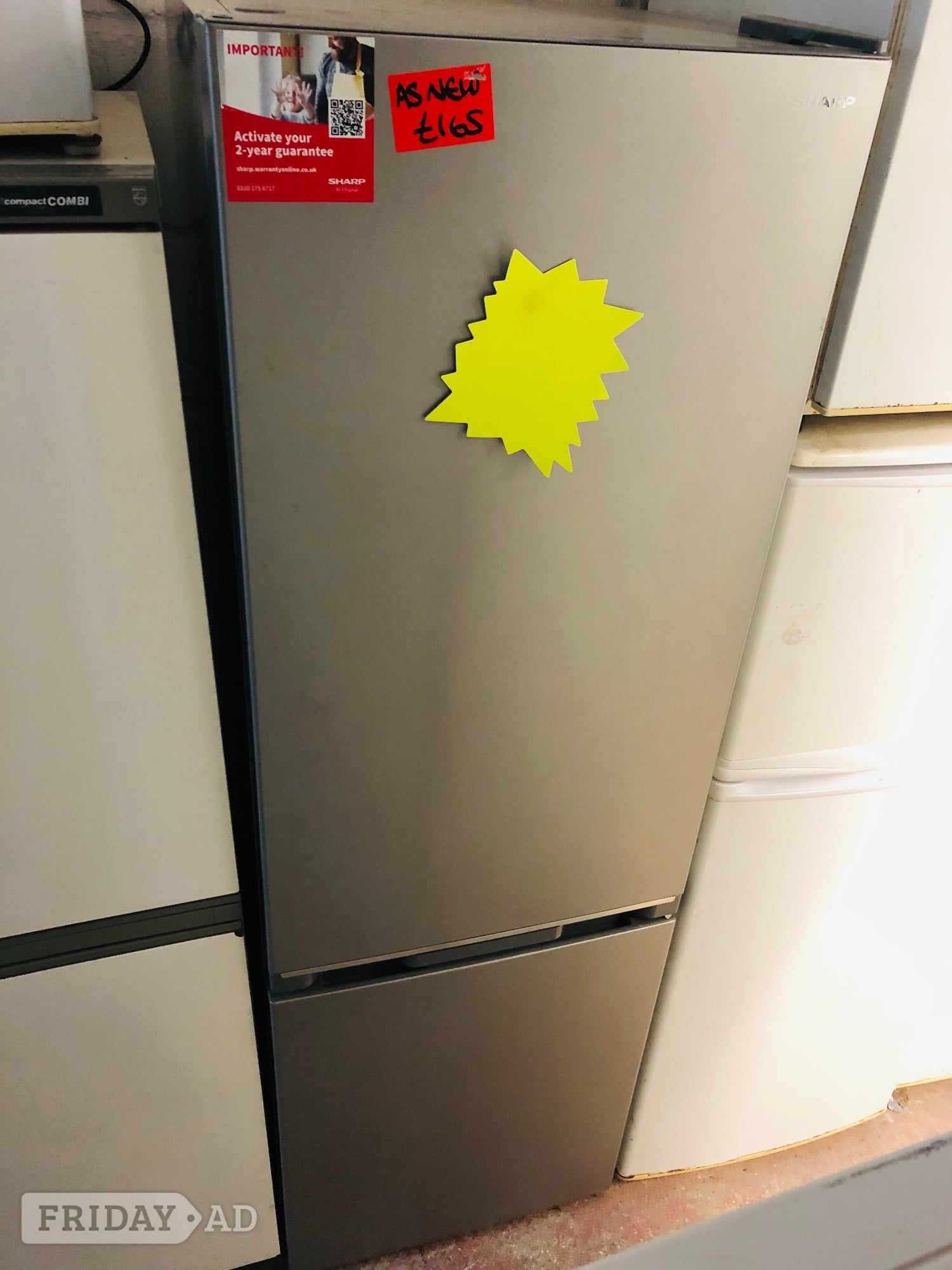 Sharp frost free silver fridge freezer as new . in Milton Keynes