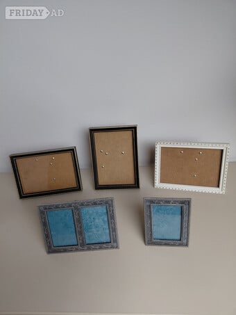 An Assortment of Small Photo Frames