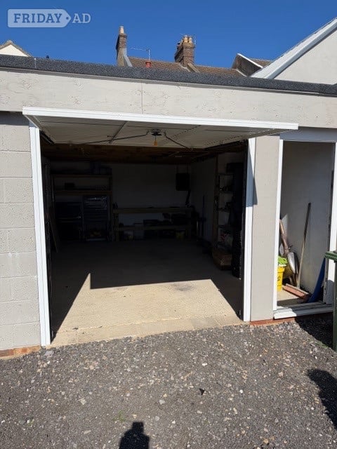 Large garage with separate pedestrian access - Garages & Parking
